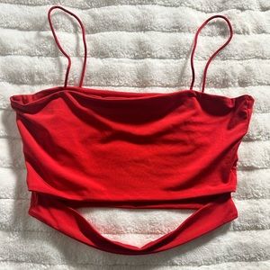 Red crop top with band across bottom with slit Size:S